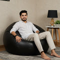 Black Leather bean bag with free footstool