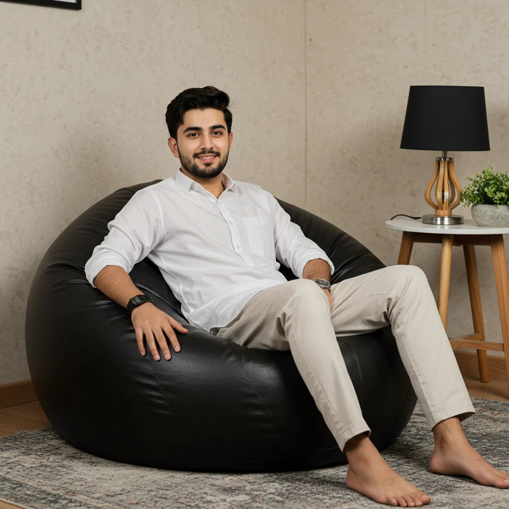 Black Leather bean bag with free footstool